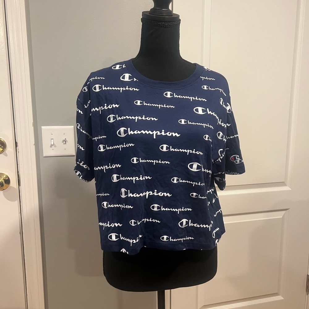 champion logo all over graphic crop top